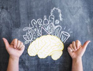 brain drawn vegetables with thumb up sign chalkboard